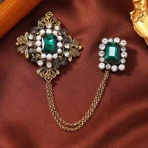 Anthropologie Gold and Emerald Brooch Set
